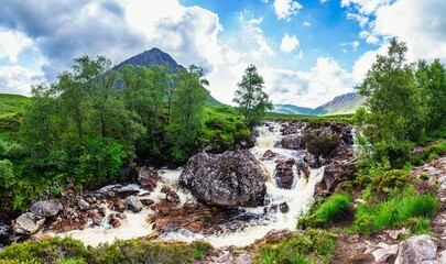 Fototapeta na wymiar Waterfall under Buachaille Etive Mòr, River Coupall, Glen Etive and River Etive, Highlands, Scotland, UK