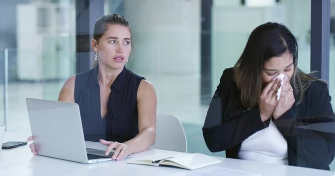 Woman, sick and sneezing in office, virus and flu for infection, sinus and business meeting. Blow nose, colleague and uncomfortable in workplace, fever and healthcare for disease or spread germs