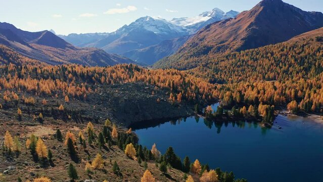 Aerial 4K, autumn panoramic view of Viola Lake in di Campo valley near Poschiavo in Switzerland