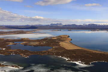 Mývatn is a shallow lake located in an area of active volcanism in northern Iceland, near the Krafla volcano