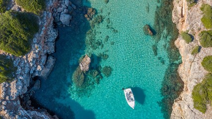 SPAIN - MALLORCA - Topdown drone view for the Beach / Boat / Sea