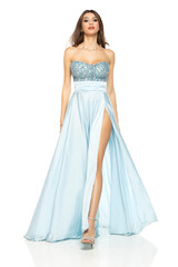 Full length of gorgeous elegant sensual brunette woman walking in blue evening dress isolated on...