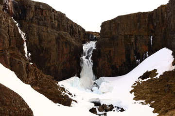 Fototapeta na wymiar Fardagafoss is a waterfall located just outside of Egilsstaðir on the route towards Seyðisfjörður town