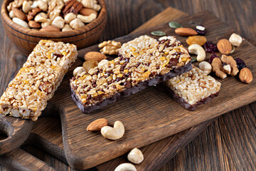 Granola bar on wooden background