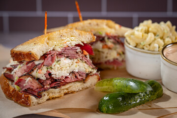 Corned Beef, Pastrami, Swiss Cheese, Coleslaw and Russian Dressing with Pickle and Macaroni Salad on the side