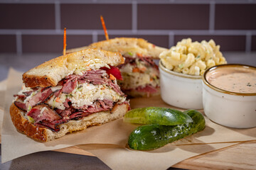 Corned Beef, Pastrami, Swiss Cheese, Coleslaw and Russian Dressing with Pickle and Macaroni Salad on the side