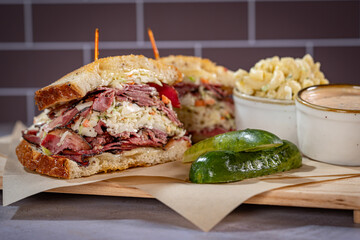 Corned Beef, Pastrami, Swiss Cheese, Coleslaw and Russian Dressing with Pickle and Macaroni Salad on the side