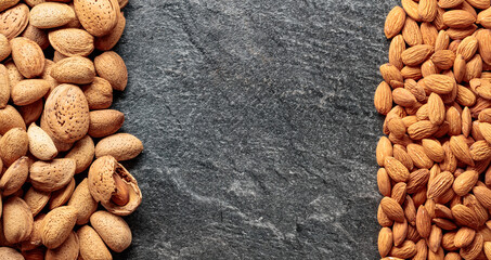 Almonds on a stone background.