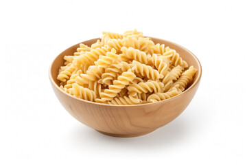raw fusilli rotini in wooden brown bowl, uncooked Italian pasta in slide, isolated on white background, selective focus