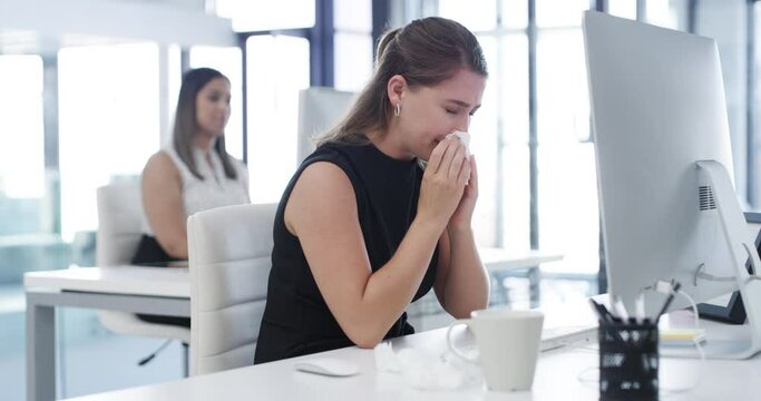 Woman, sick and blowing nose in office, computer and virus for infection, sinus and cold symptoms. Sneeze, colleague and allergy in workplace, hayfever and healthcare for disease or spread germs
