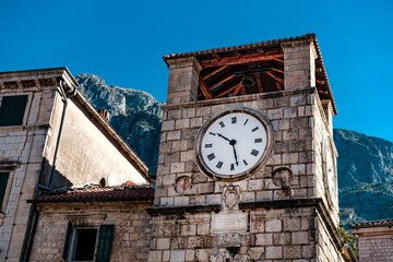 kotor tower clock in square old town, popular touristic place