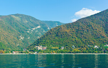 Beautiful coastline of Old Gagra - famous resort on the Black Sea and view of abandoned palace of...