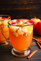 Fall Sangria Made with White Wine, Apples, Pears, and Cinnamon: Autumn sangria flavored with chunks of fruit, bourbon whiskey, and maple syrup