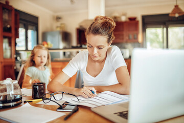 Stressed Mother Managing Finances and Work with Child at Home - obrazy, fototapety, plakaty