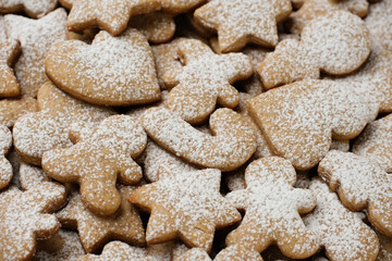 Christmas cookies with sugar powder. Gingerbread cookies close up