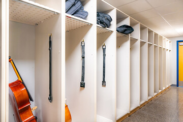 Storage closet for multiple cellos and other instruments.  © Thomas
