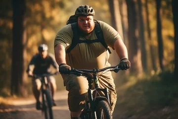 Keuken foto achterwand A group of fat overweight people riding bikes in a park. © Degimages