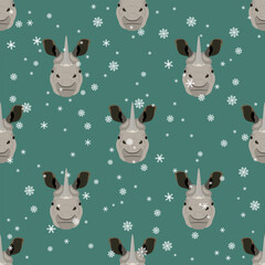 Obraz premium Seamless animal pattern with horned heads of Indian rhinoceros and snowflakes. (Rhinoceros unicornis). Seasonal winter design. Funny animal masks. Cartoon style. On green background.