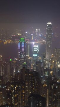 Hong Kong Skyline at Night. Time Lapse. Vertical Video
