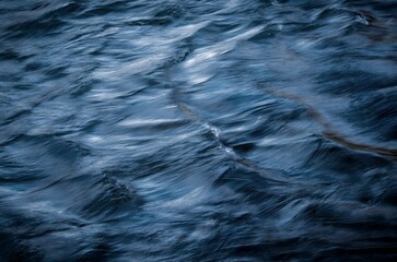 dark abstract background of river surface