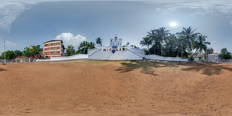 hdri 360 panorama of portuguese catholic Immaculate Conception Church with stairs in jungle among palm trees in Indian town in equirectangular projection. VR AR content