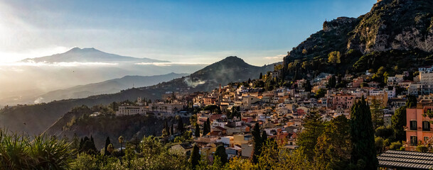 Sunset on Taormina town in Sicily - obrazy, fototapety, plakaty