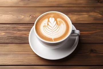 Plexiglas foto achterwand A cup of latte on a wooden table background © Rekalawa