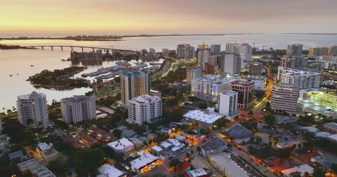 Sarasota, Florida city architecture at sunset. High-rise office buildings in downtown district. Real estate development in Florida. USA travel destination.