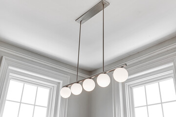 Modern Minimalist Dining Room Lighting with a Linear Pendant Chandelier Featuring Seven Frosted...