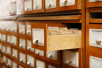 Obraz na płótnie Canvas Closeup view of library card catalog drawers