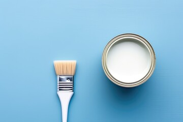 Classic Blue background with open paint can and paint brush Top view - obrazy, fototapety, plakaty