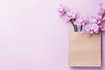 Orchid flowers placed inside a paper bag.