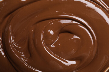 Tasty chocolate paste as background, closeup view