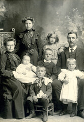 Fototapeta premium Antique 1880's Photo Of a Large Family of Eight Showing the Fashion of the 1880's.