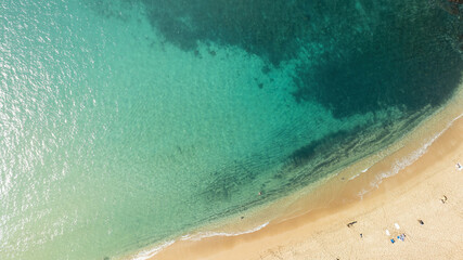 Fototapeta na wymiar Calm glassy ocean at Waimea bay, North shore, Oahu, Hawaii
