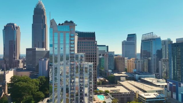 Aerial view of downtown district of Charlotte city in North Carolina, USA. Glass and steel high skyscraper buildings in modern American midtown
