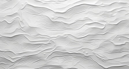 A white textured wall with a pattern on it