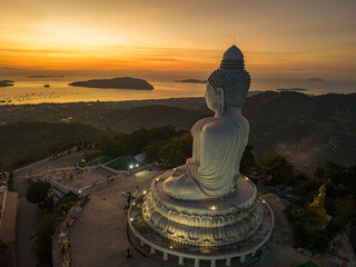 Amazing sweet sky in sunrise at Phuket big Buddha. .The beauty of the statue fits perfectly with...
