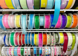 Several rolls of ribbons in many colors.