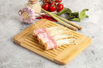 Raw Enoki mushroom with bacon