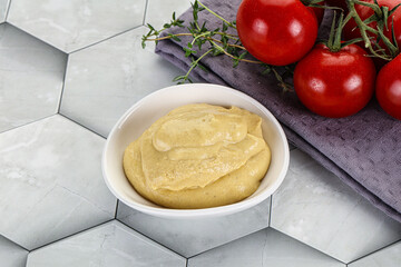 Dijon mustard sauce in the bowl