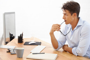 Web design, thinking or man with computer reading information for project or solution in office. IT...