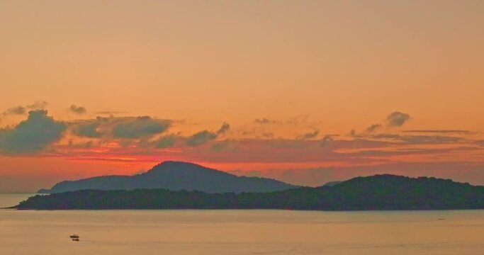 .Majestic sunset or sunrise landscape Amazing light of nature amazing cloud scape sky. .beautiful sky reflection of sunrise in sea surfece..stunning colorful sky at yellow sunrise above the islands.