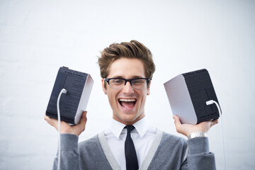 Man, happy and hard drives for storage space, geek and cables for computer, face and young....