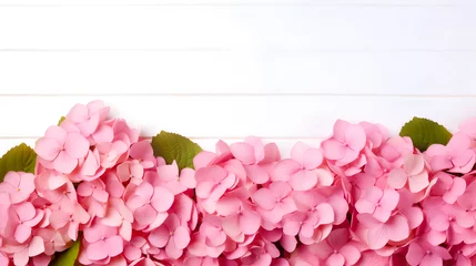 Poster flower backdrop with pink hydrangea flowers on wooden background © Pakamas