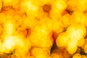 abstract photo of light gold, yellow abstract background with bokeh defocused lights. image is blurred and filtered