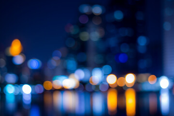 Abstract bokeh night in city background, cityscape at twilight time blurred photo