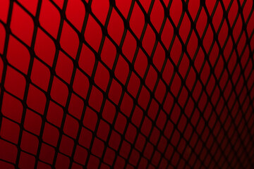 Red background of wavy red metallic grid with holes. Metal mesh as background. Perforated metal...