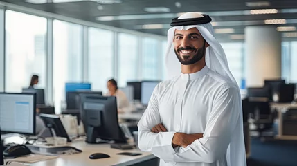 Zelfklevend Fotobehang Happy Emirati Arab at office wearing Kandura ©  Mohammad Xte