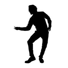 Silhouette of a male dancer in action pose. Silhouette of a slim man in dancing pose.